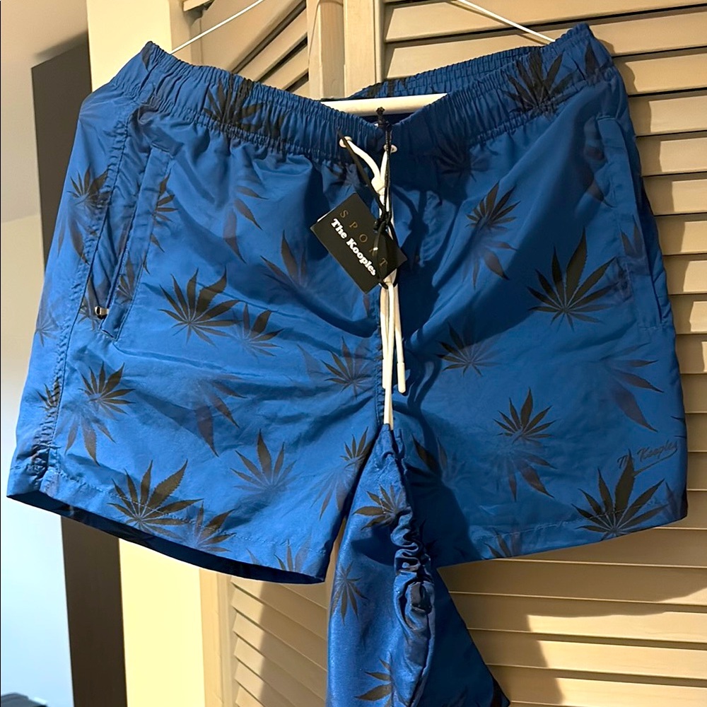 CLEARANCE SALE THE KOOPLES Blue and Black Swim Trunks. NWT.